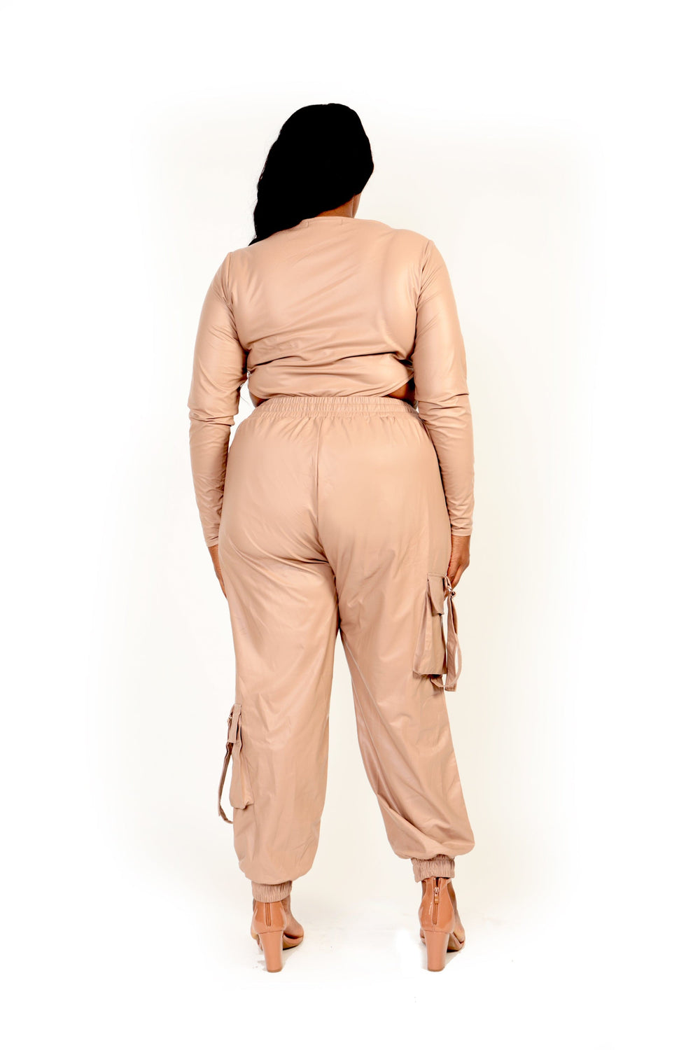 Back view - Two piece faux leather outfit. Top is a g string body suit.